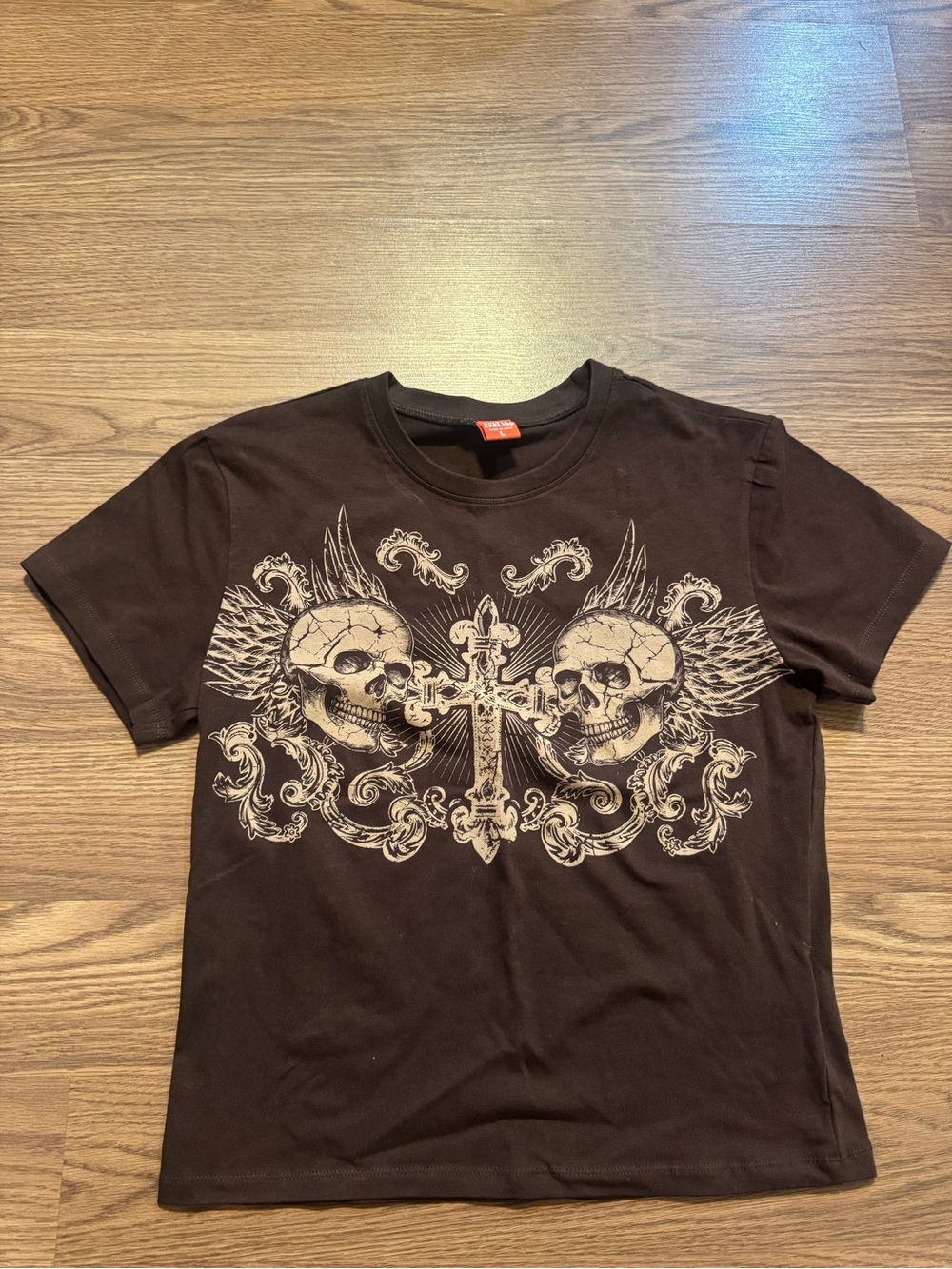 Women's Brown Short-Sleeve Graphic Tee with Winged Skull Cross Design READ DESCR